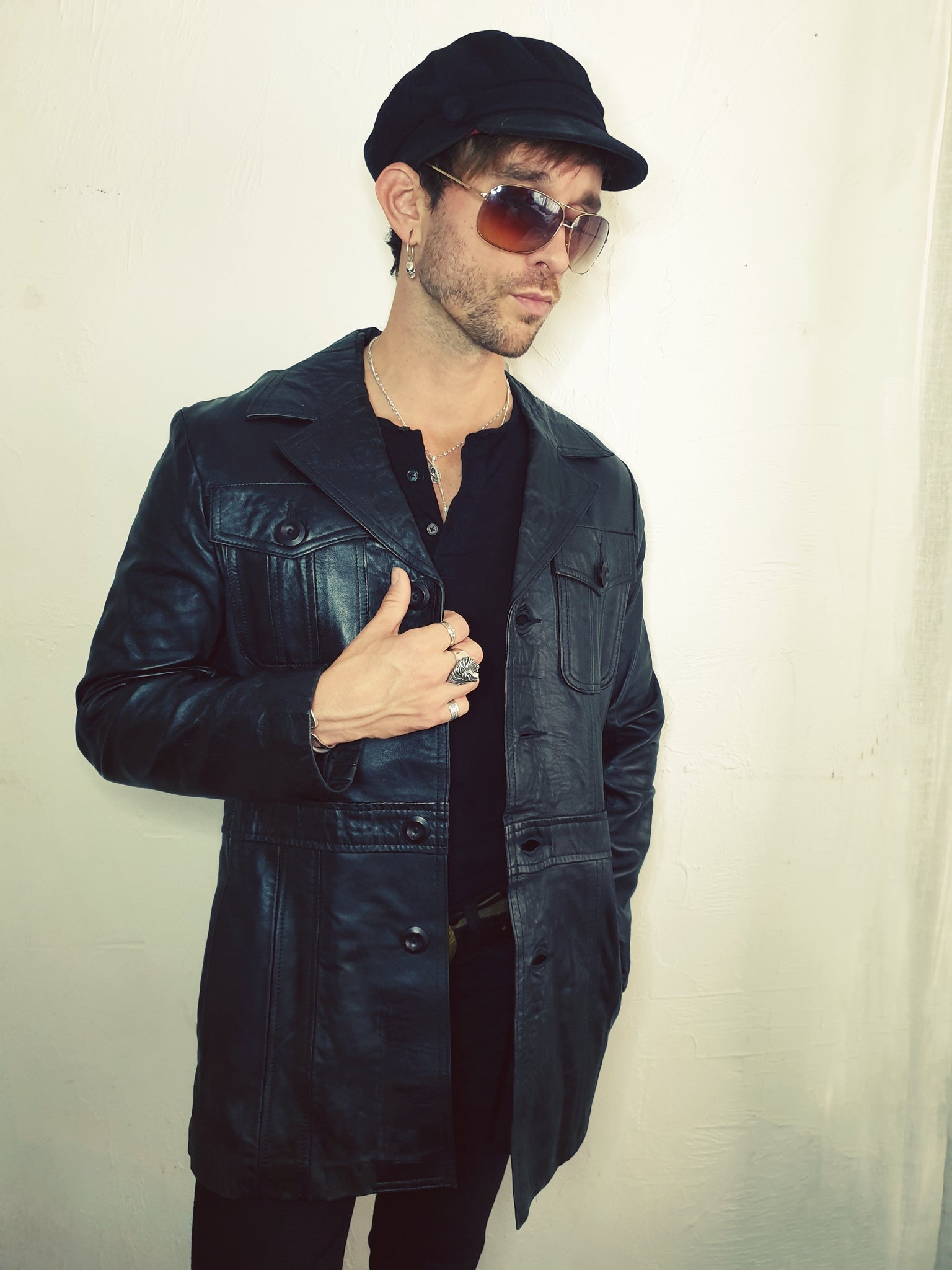 Black leather on sale jacket with cap